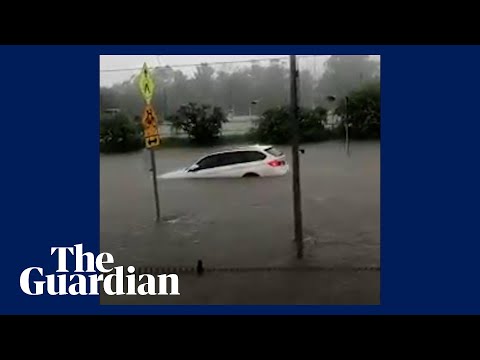 Sydney high school students watch car float past classroom in NSW, Australia floods