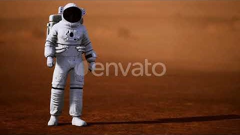 Astronaut on Mars Surface. Red Planet Covered in Gas and Rock | Motion Graphics - Envato elements