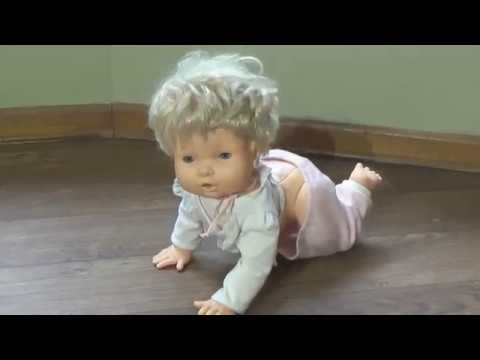 crawling creepy doll