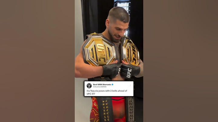 Ilia Topuria poses with 2 belts ahead of UFC 317