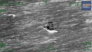 Coast Guard hoists man from sinking catamaran offshore Kaua i