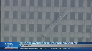 Window washers rescued from skyscraper