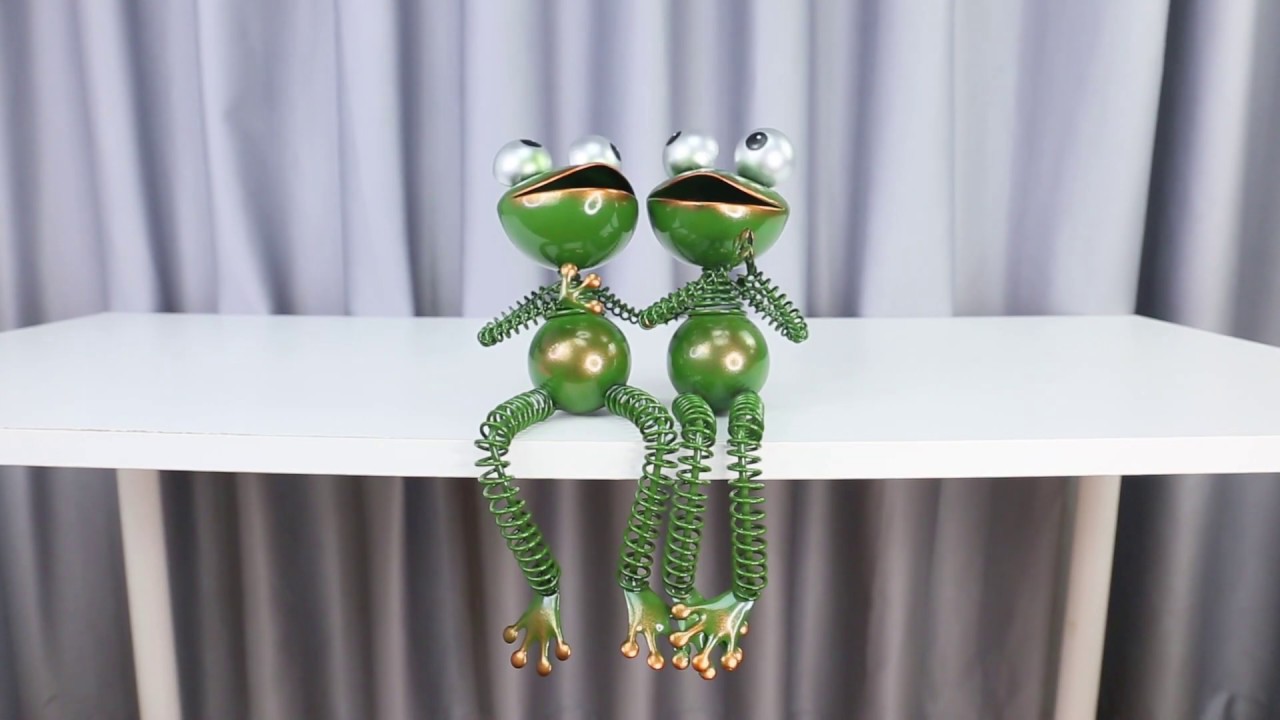Metal naughty playing frog sculpture