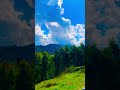 The clouds and mountain whisper about rain .#clouds #mountains #naturalbeauty #rain #greenery