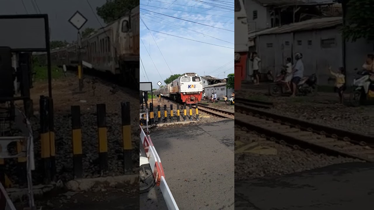 KERETA API PANDALUNGAN LEWATI JPL 194 MENUJU STASIUN PEMBERHENTIAN KOTA PROBOLINGGO 