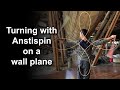 Advanced Poi Spinning: Turning with Antispin on a Wall Plane