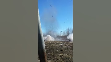 Demo range - 5lbs C4 on a 5 gallon water jug (car)