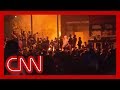 CNN reporter says 'zero' police presence as Minneapolis precinct burns