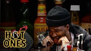 Curren$y Talks Munchies, Industry Games, and Rap Dogs While Eating Spicy Wings | Hot Ones