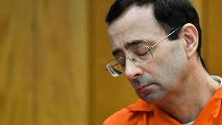 Victims father lunges at Larry Na ssar in court after daughters read impact statements