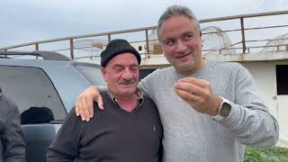 Gerge el Dayaa the Fisherman is Back. Calamari Under the Rain. Dinner and Arak on the Boat