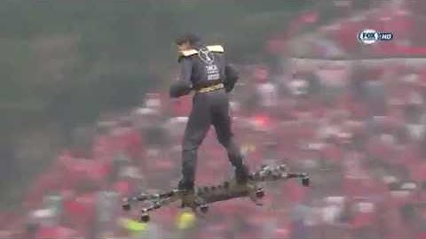 FLYING in the Portuguese Cup Final. Official receives the football