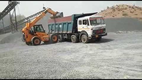 JCB 530-70 Telehandler - Loading Crushed Stone from a Stone Crusher Plant onto Dumper Truck