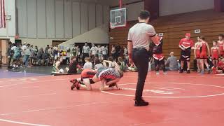Amazing back bend by girl vs boy middle school wrestling