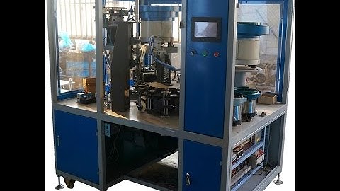 Automatic assembly and riveting machine