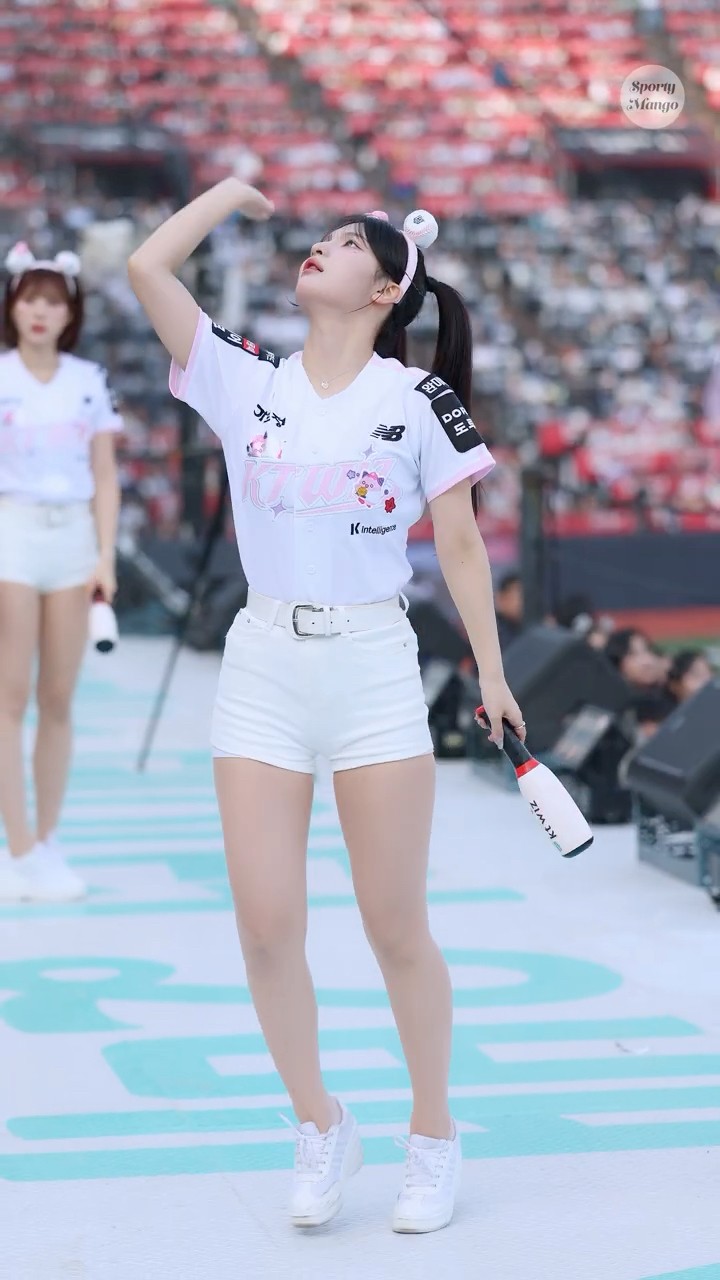 Cheerleader Kwon Ga-young tries to catch the pitch herself after being told to watch out for the ...