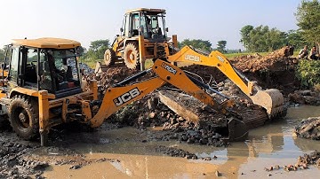 JCB Backhoe Machine Throwing Out Broken Bridge Concrete - JCB Working For Bridge Construction