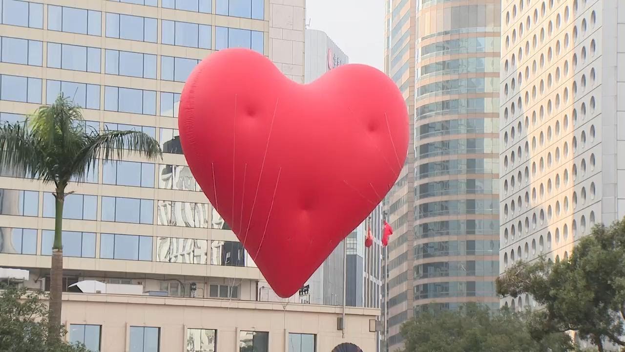 Giant heart balloon designed by artist Anya Hindmarch floats above Hong Kong