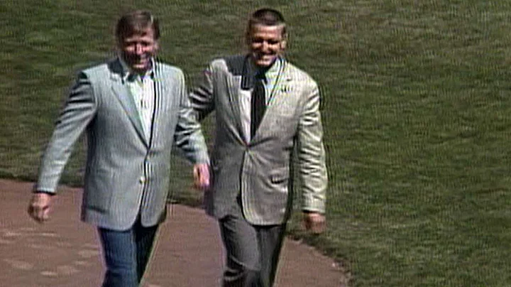 Mickey Mantle, joined by Roger Maris, tosses first...