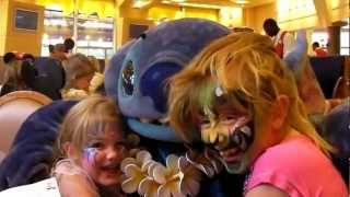 Stitch being naughty while signing autographs at Cafe Mickey in Disneyland Paris