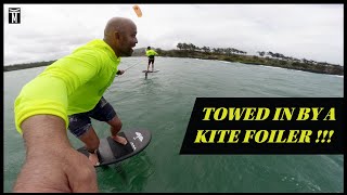 Kyle Maligro gets Towed in by Kite Foiler!