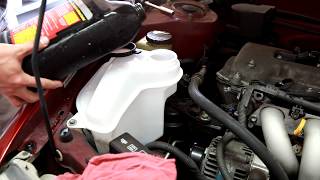 1998-2002 Toyota Corolla washer fluid reservoir remove and replace 1998 Geo Prizm Windshield Wipers