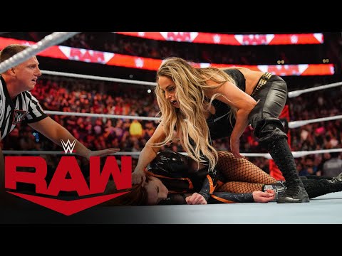 Trish Stratus attacks Becky Lynch after they lost the WWE Women’s Tag Team Titles