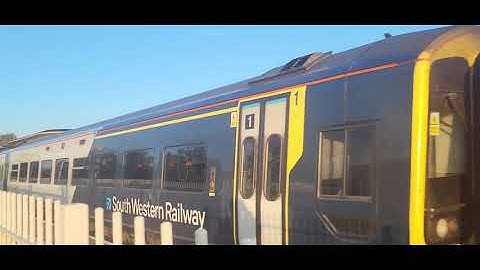 Class 159018 and Class 158881 passing Wimbledon at speed 27/09/25