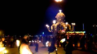 El Pulpo Mecanico Surrounded By Fire Spinners And Flame.