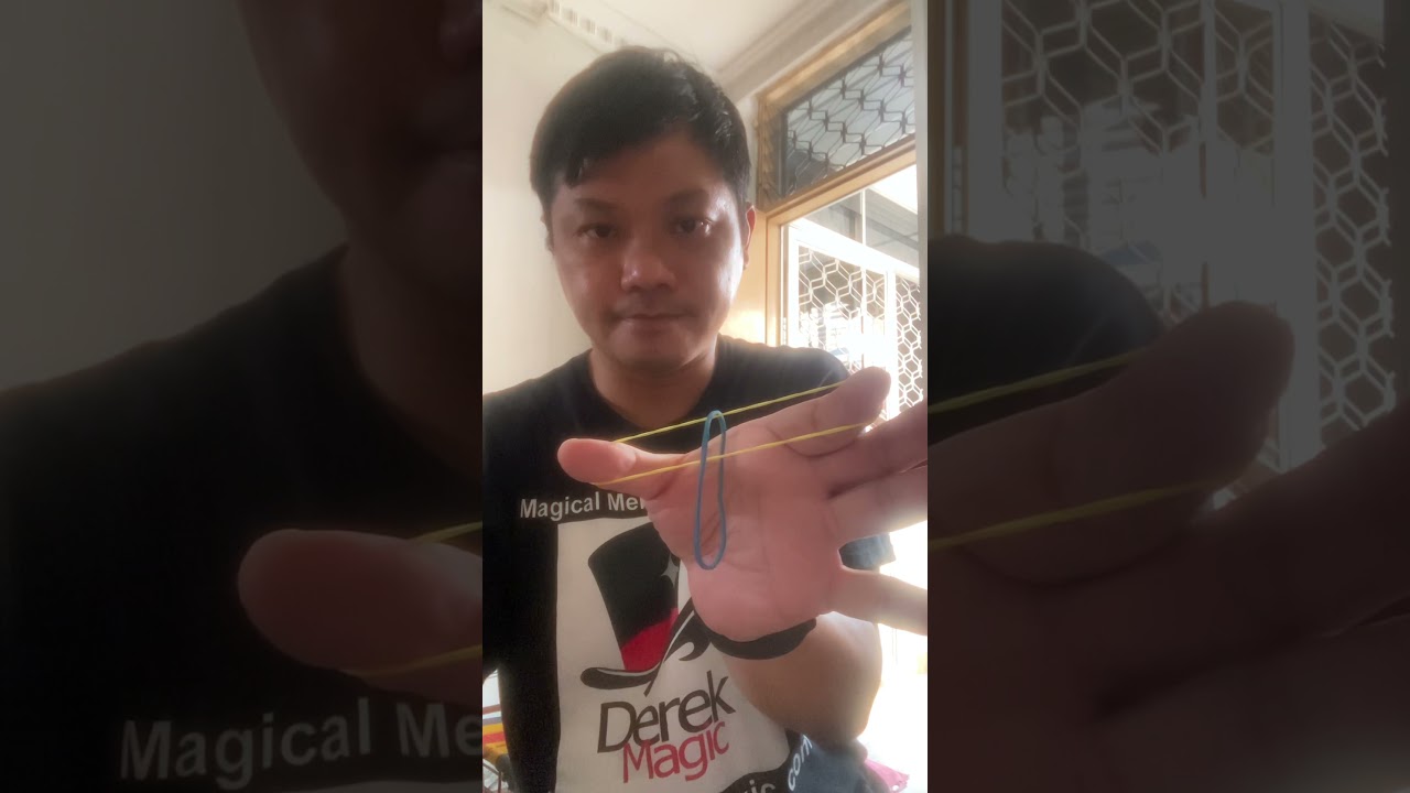 Rubber-band changing places by Singapore Kids party Magician Derek