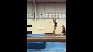 Backhandspring Layout-Stepout on High Beam (no mats)