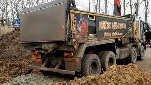 Sloppy wet clay from plant washings being tipped from grab lorry