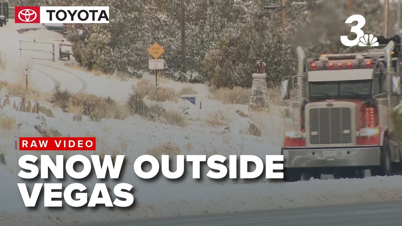 Snowfall blankets mountains outside Las Vegas