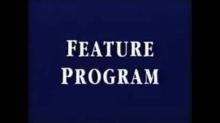Feature Program Zoom-In Logo With Dark Blue Background And White Text Slow Motion