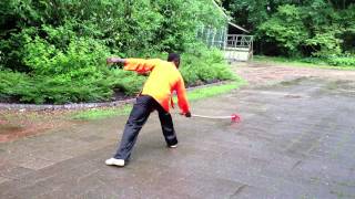 Sifu Franck Youmbi perform a qiang shu basic form (Youm's Black belt Wushu Academy)