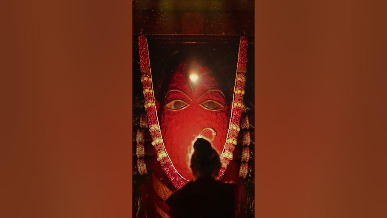 As the flames of the sacred fire dance in reverence, the Mother Goddess bathes in a majestic glow