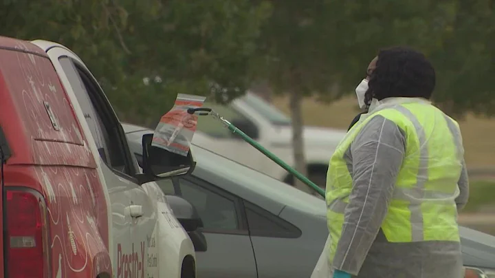 Hundreds flock to Fort Bend County mega drive-thru...