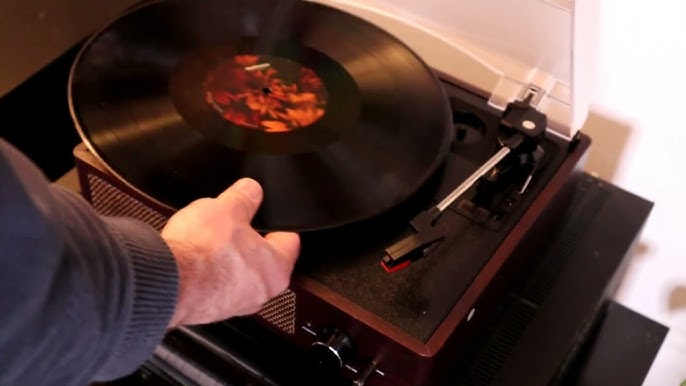 Redescubre la magia del vinilo con el Tocadiscos Bluetooth Retro -  Electrousos