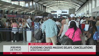 Closures due to flooding creates confusion at DTW's McNamara Terminal