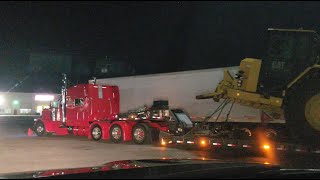 Custom Peterbilt 389 Transporting A Huge Caterpillar 657G Scraper Tractor