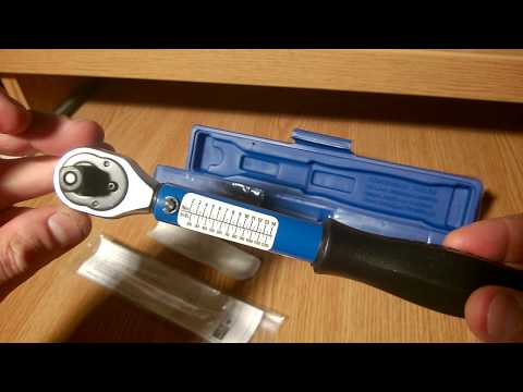 Video: Click type torque wrench ua haujlwm li cas?