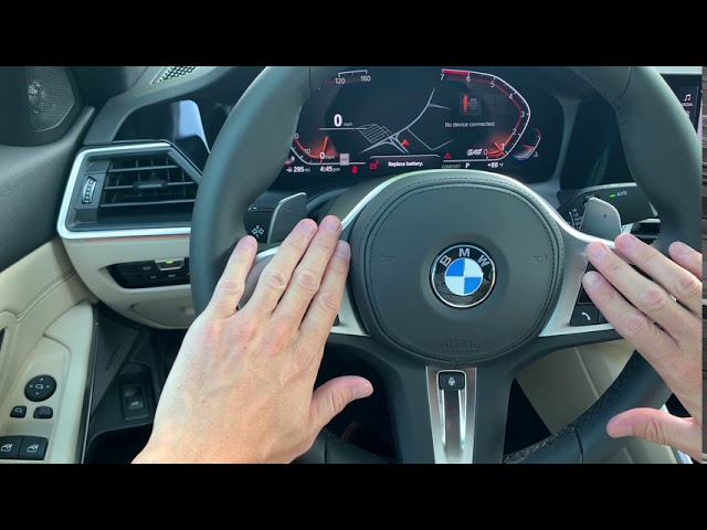 The interior of the 2019 BMW 330i is nicely understated. The console is  busy with remote infotainment controller, MODE button, and ON/OFF button --  but a monostable shifter helps create enough space