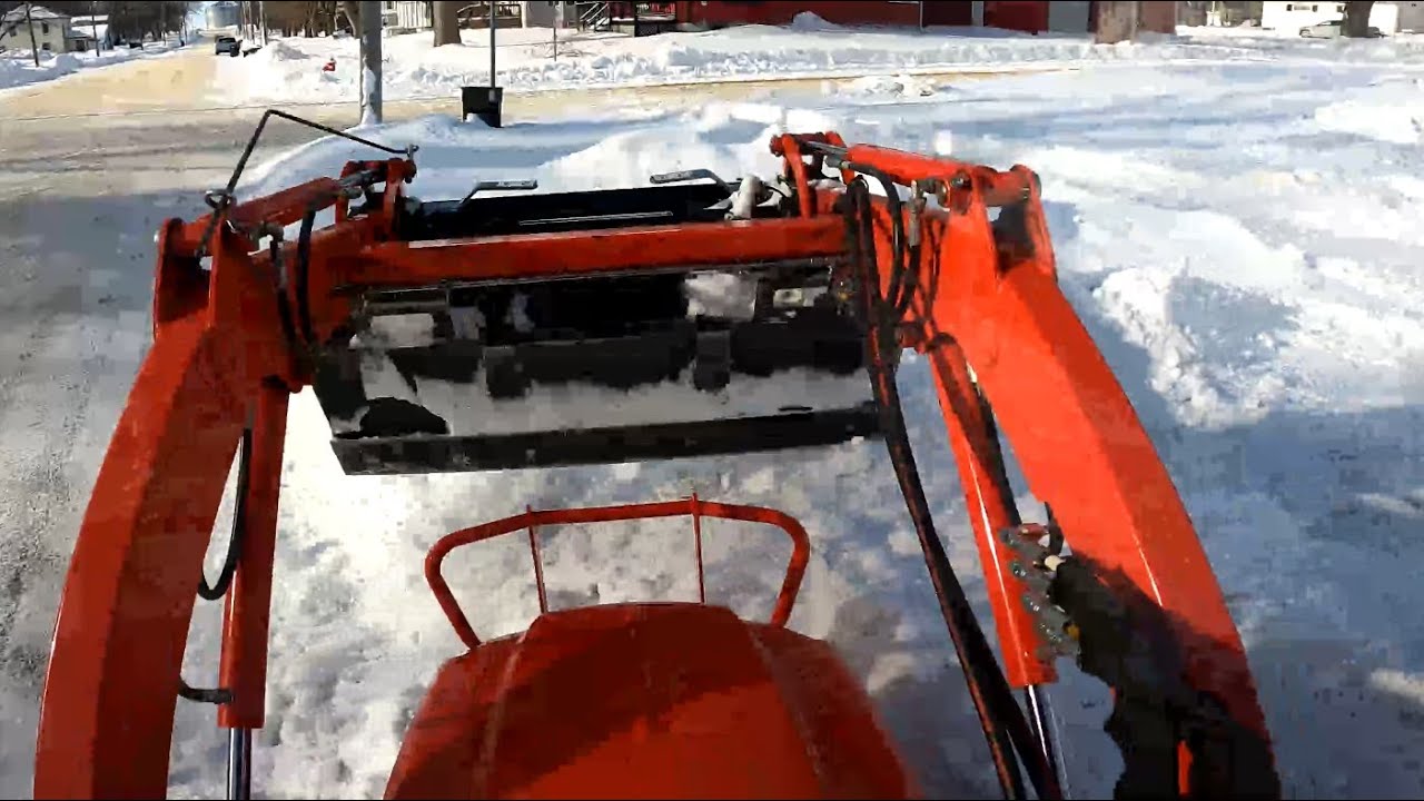 Warm day snow removal touch up with Kioti CS2520