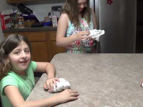 the girls making tie dye shirts part 1 the twist..lol
