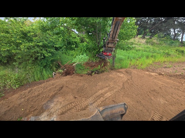 Leveling ground with soil after the rain