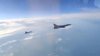 قاذفات تيو-22م٣  الروسية  تقوم بطلعات فوق البحر الاسود  مقاتلات سو٣٠ س م٢ su30SM2 escorting Tu-22M3