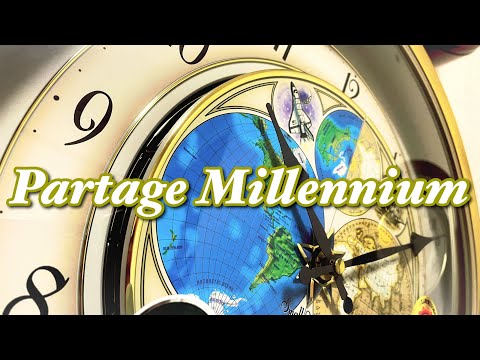RHYTHM Small World Partage Millenium motion clock - YouTube
