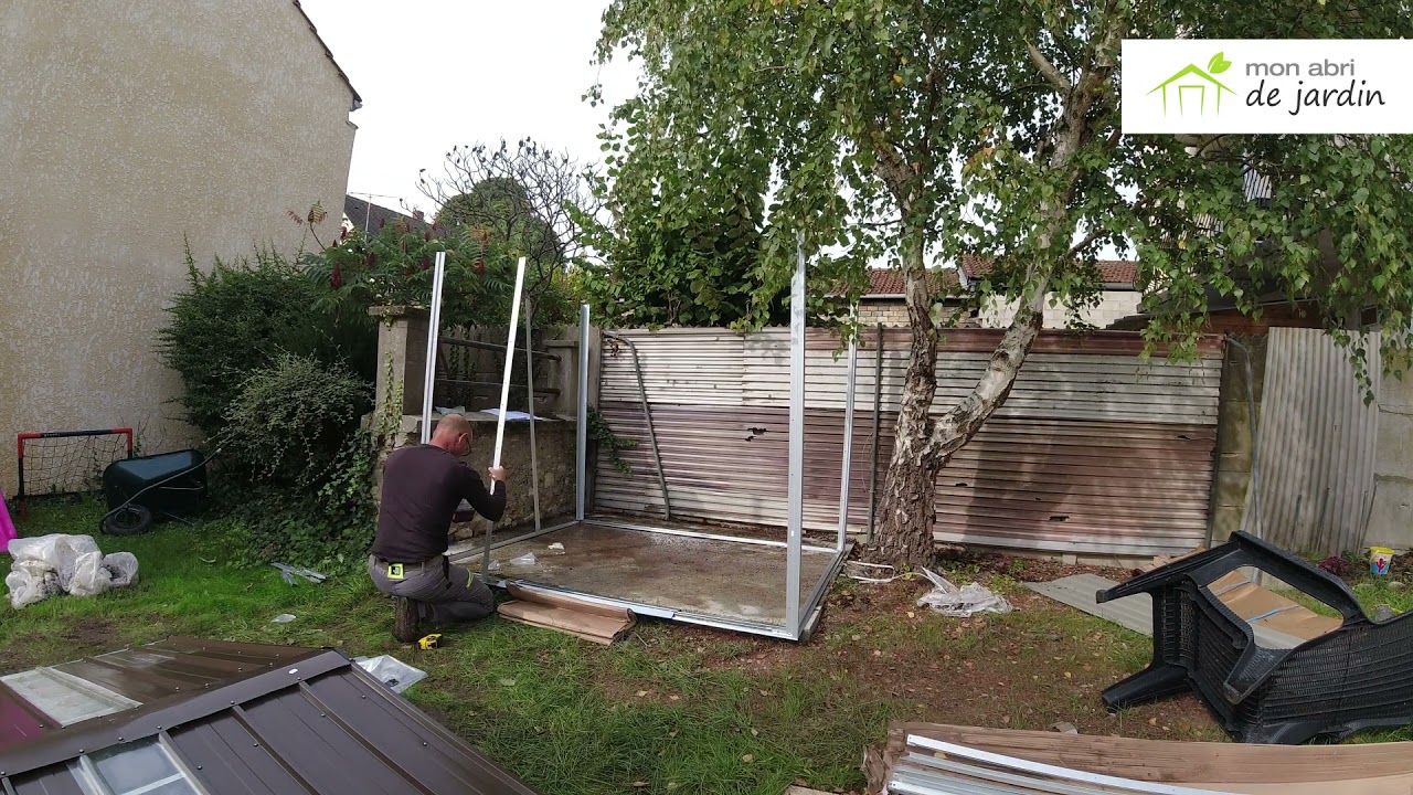 Montage de l'abri de jardin métal beige et marron + kit d'ancrage — free download