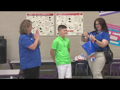 Academy representatives visit Port Neches Elementary School to surprise fourth grader