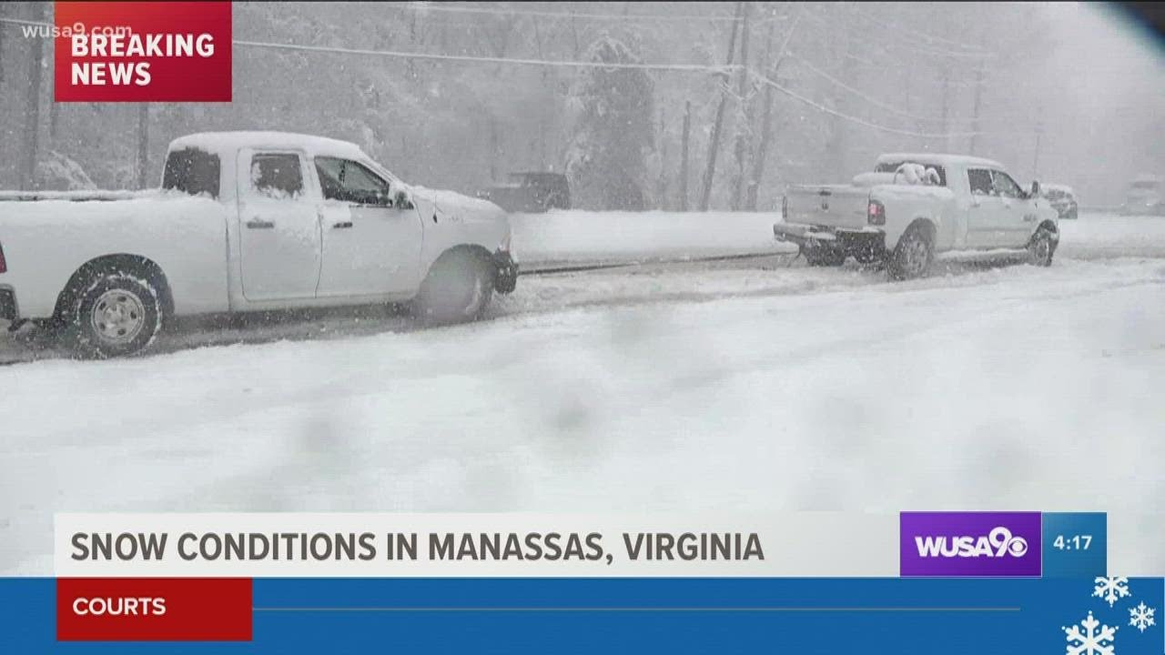 Good samaritans help rescue stranded cars from snowy roads